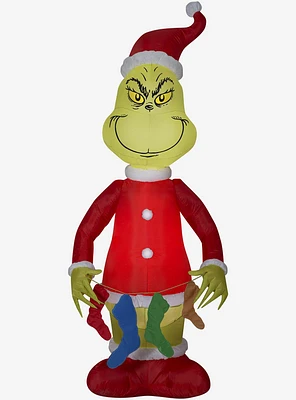 Grinch Holding String Of Stockings Airblown