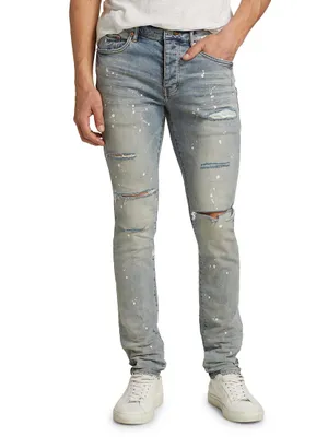 P001 Paint Splatter Distressed Skinny Jeans