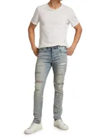 P001 Paint Splatter Distressed Skinny Jeans