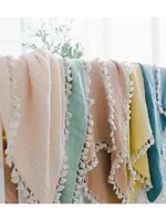 Baby's Tassel-Accented Blanket