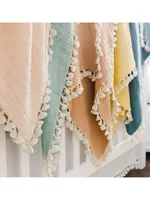 Baby's Tassel-Accented Blanket