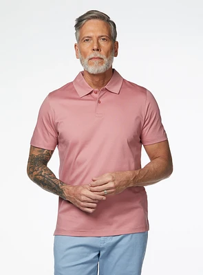 Polo rose en tricot uni