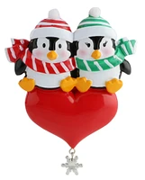 Penguin Sitting on the Heart Ornament