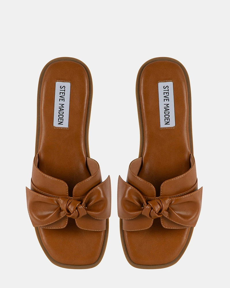BLESSED TAN