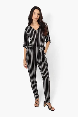 Limite Striped Front Zip Jumpsuit