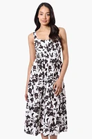 Limite Floral Smocked Waist Midi Dress