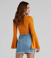 Wrapped Chic Bell Sleeve Top