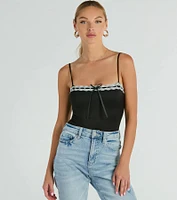 Darling Sass Sleeveless Lace Trim Bow Bodysuit