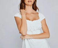 Flirty Style Smocked Romper