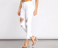 High Rise Destructed Denim Skinny Jeans