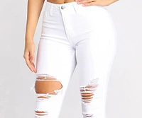 High Rise Destructed Denim Skinny Jeans