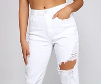 High-Rise Destructed And Frayed Mom Jeans