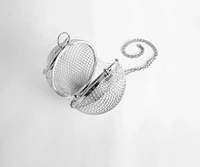 Can't Be Caged Sphere Clutch