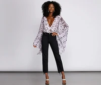 The Drama Bell Sleeve Bodysuit