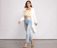 First Class Peplum High Low Jacket