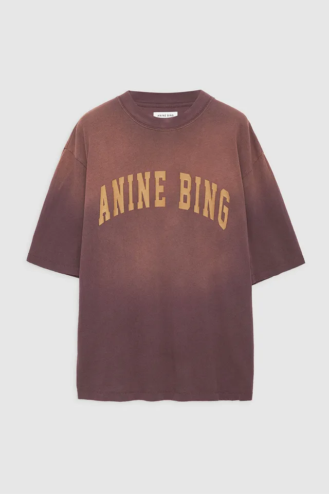 The Avi Tee Smiley by Anine Bing is an oversized, boxy T-shirt constructed  from lightweight jersey in a vintage black wash. It features a