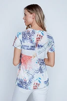 Le t-shirt dévoré à imprimé abstrait