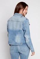 La veste en denim avec détails strass