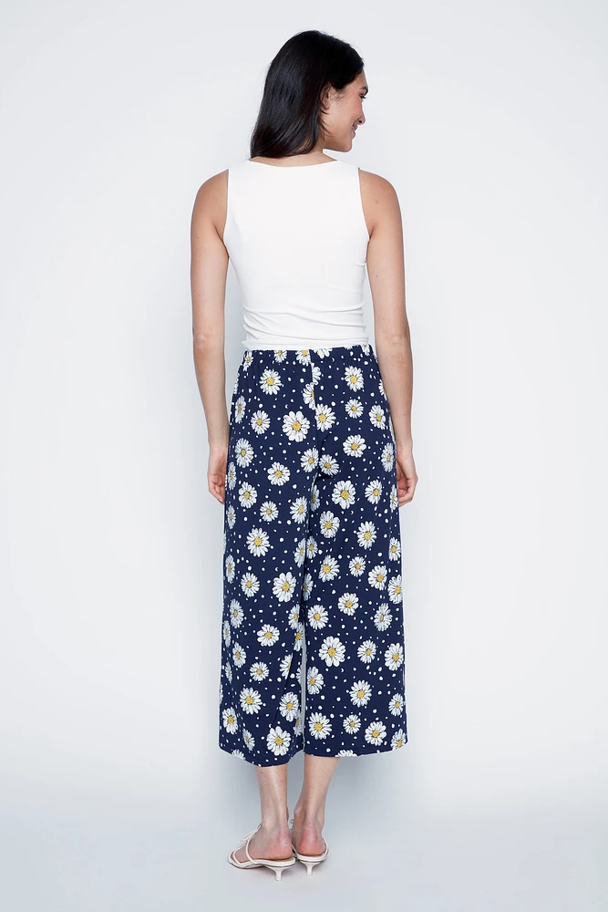 Le pantalon gaucho à imprimé pois marguerites