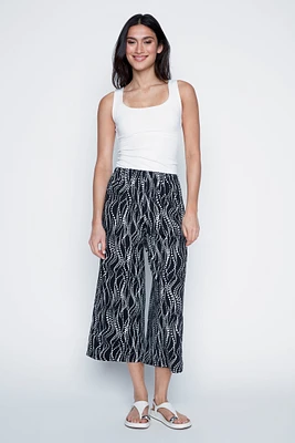 Le pantalon gaucho imprimé à pois multiples