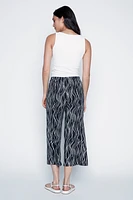 Le pantalon gaucho imprimé à pois multiples