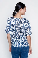 Le t-shirt dévoré avec fronces