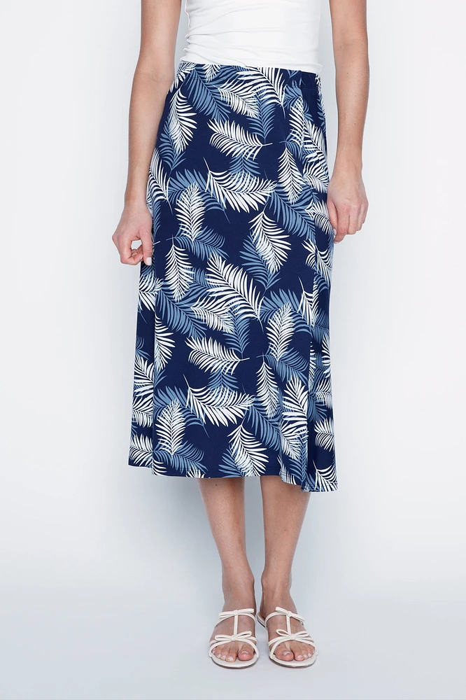 La jupe à motifs de feuilles tropicales