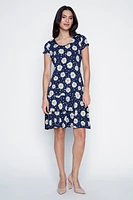 La robe à volants motif pois et marguerites