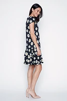 La robe à volants motif pois et marguerites