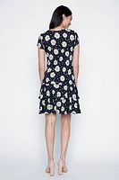 La robe à volants motif pois et marguerites