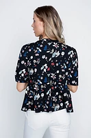 Le haut floral à fermeture nœud