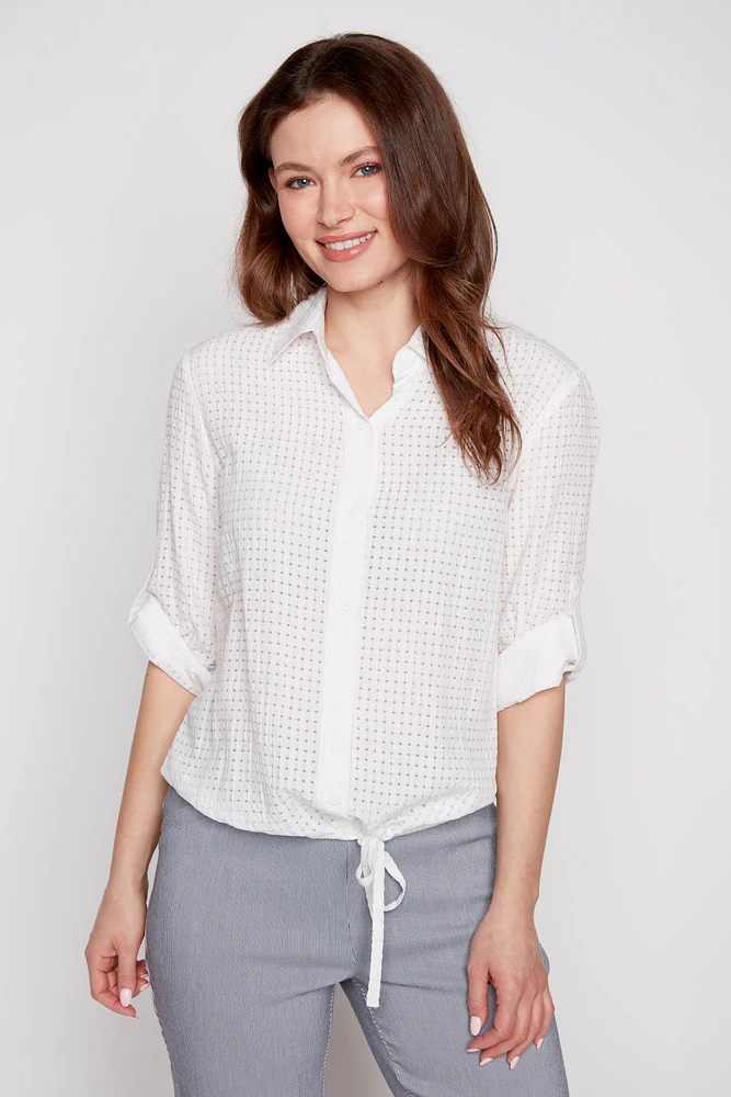 La blouse à œillets