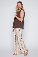 La blouse à col volanté