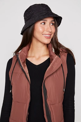 Quilted vest with sherpa hood