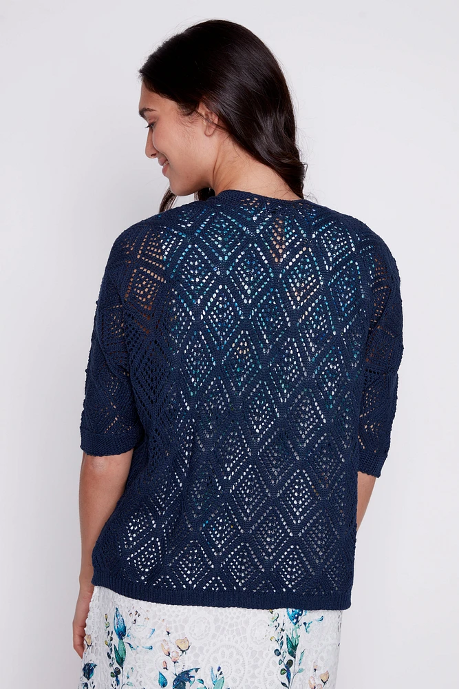 Le cardigan à motifs losanges