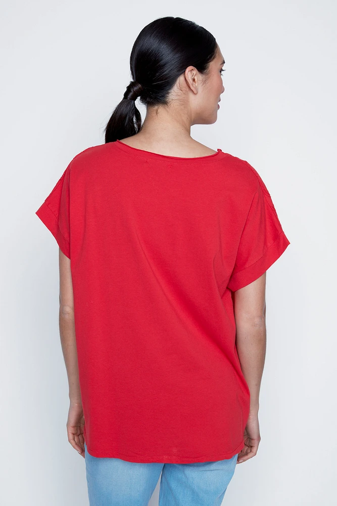 La blouse en coton à broderies gribouillis