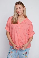 La blouse à œillets en coton