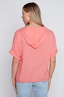 La blouse à œillets en coton