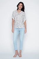 La blouse en coton à feuilles brodées