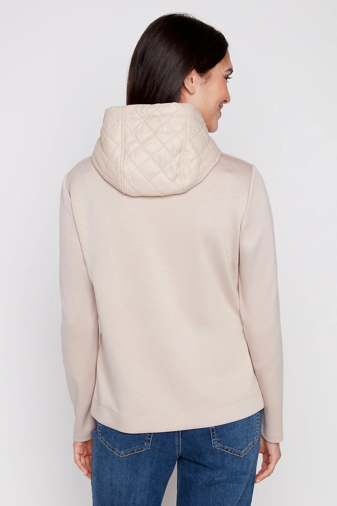 La veste à capuche matelassée