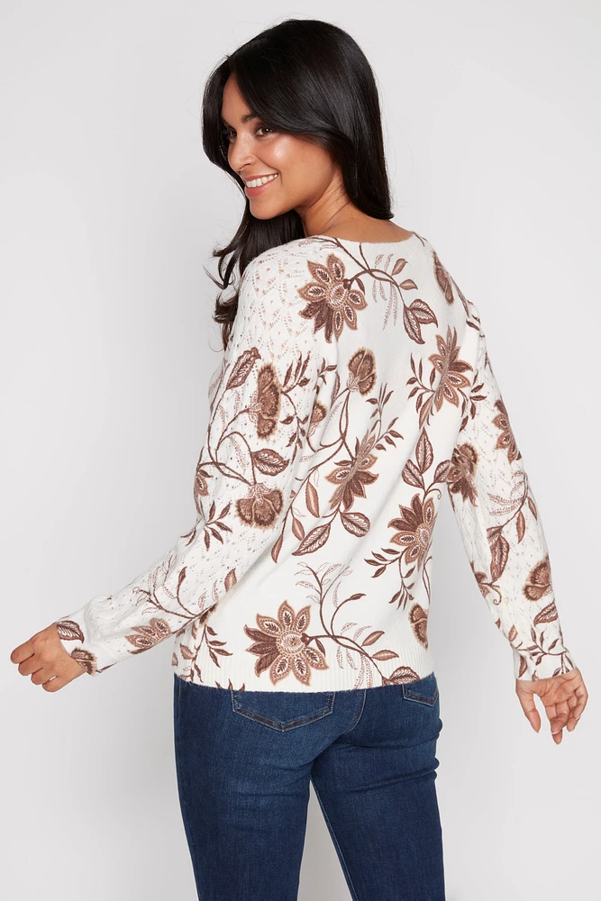 Le pull pointelle fleuri