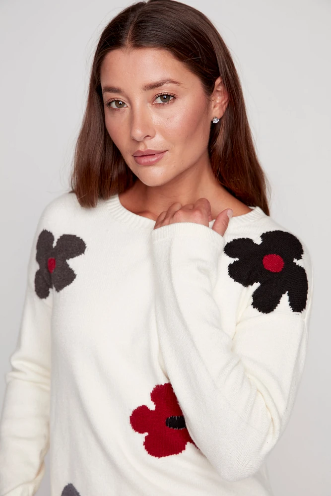 Le pull à fleurs dispersées