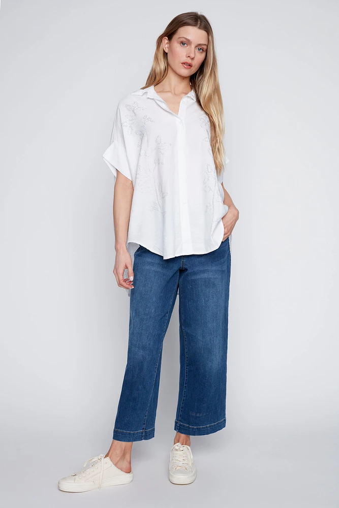 La blouse à détails strass