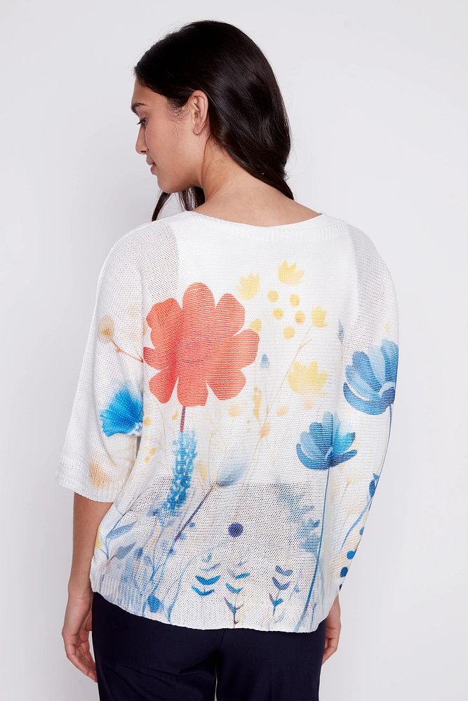 Le pull à imprimé fleuri