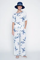 Le pantalon en coton à imprimé floral