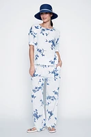 Le pantalon en coton à imprimé floral