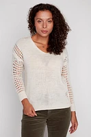 Le pull avec manches au crochet