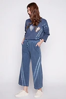 Le pantalon palazzo avec détail ruban