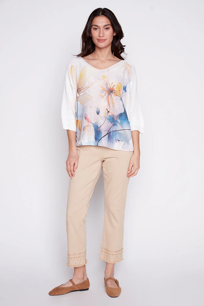 Le pull imprimé floral