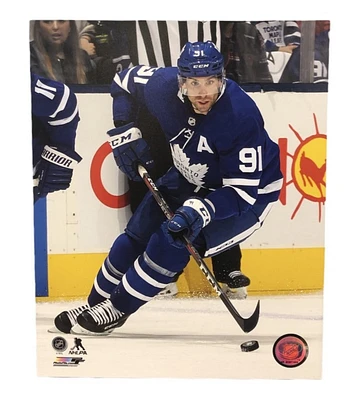 NHL 16x20 Player Photograph Puck John Tavares Maple Leafs